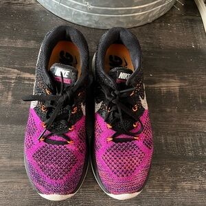 Nike Black, Pink, Purple and Orange Knit Sneakers
Slip on 7.5